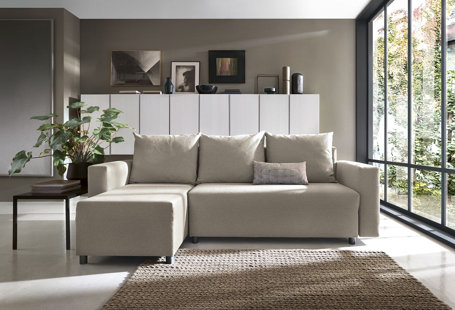 L shaped couch that turns into sales a bed